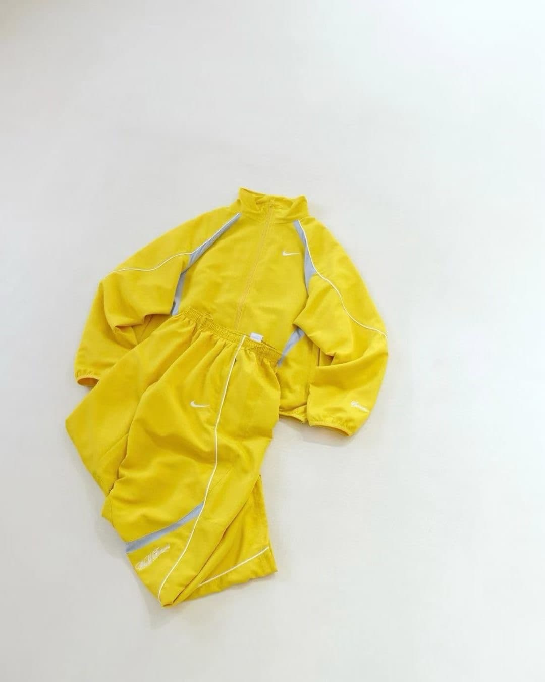 nike x suprem track yellow