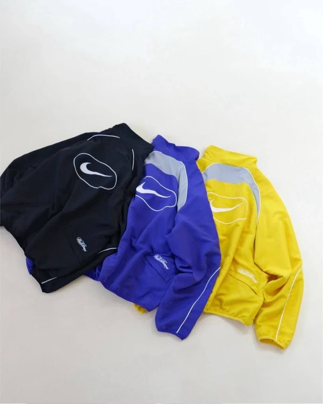 nike x suprem track yellow